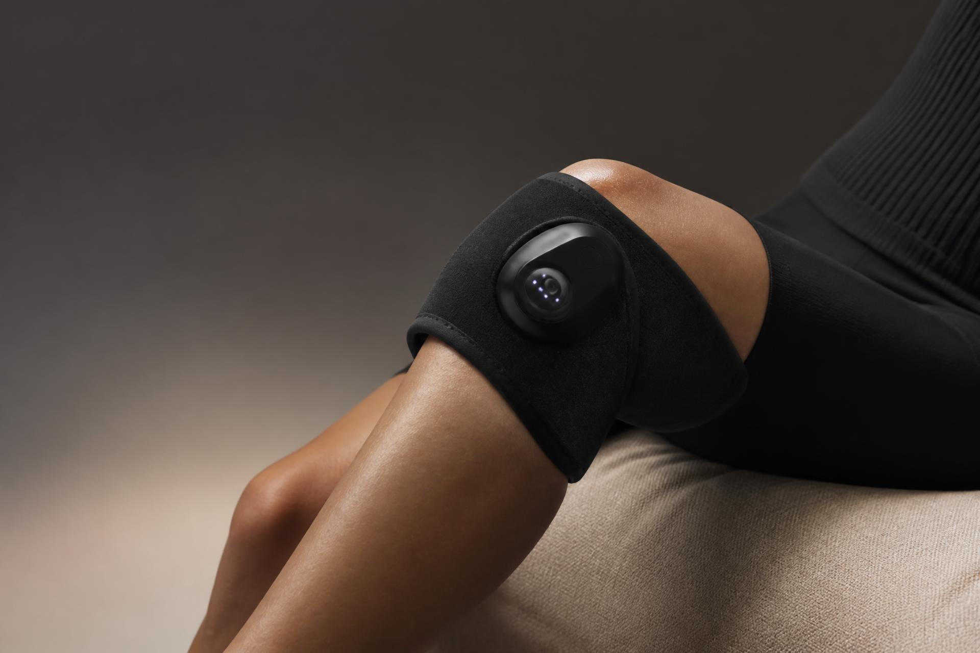 SOMA Heated Knee Massager — warm spa lighting